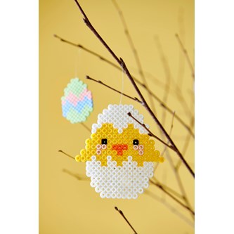 Nyklekket påskekylling av rørperler